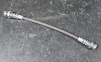 6001000552 - Tubo flexivel metálico 3/8 (270mm) trás